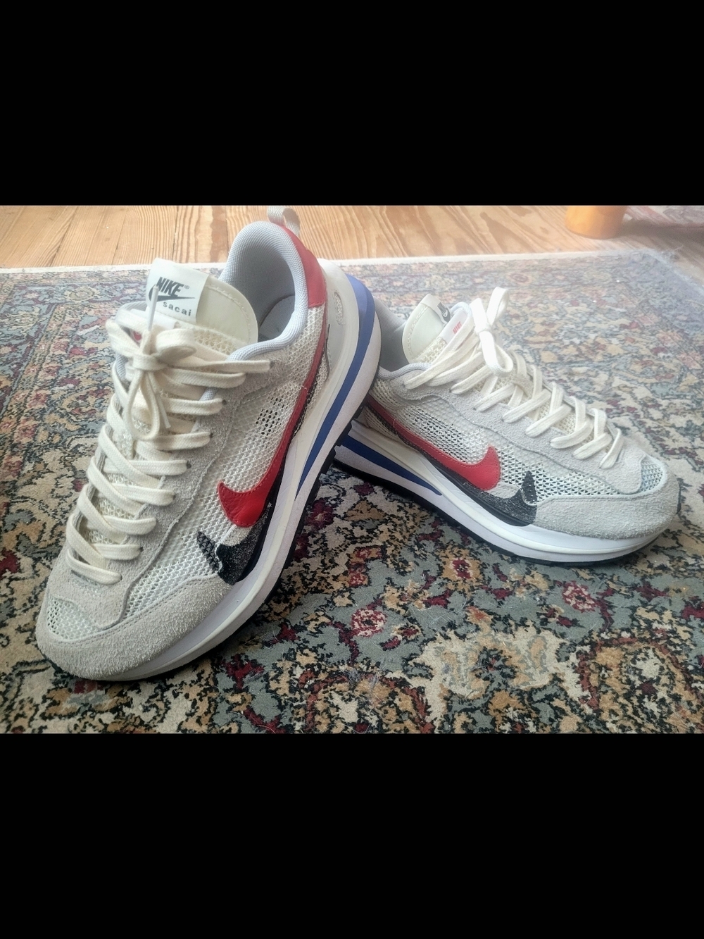 Nike Sacai VaporWaffle Sneakers in White with Red & Black Swooshes